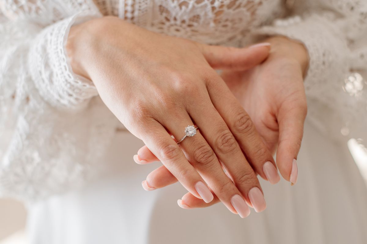 bride-with-engagement-ring-her-finger-closeup_result