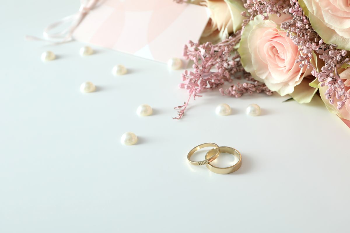 concept-wedding-accessories-with-wedding-rings-white-background_result