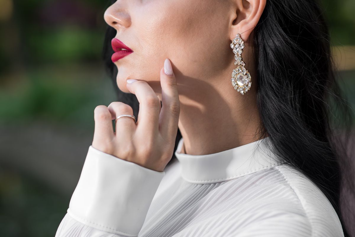 elegantbig-caucasian-brunette-woman-has-earring-ear-close-up-bijouterie-fashion-concept_result