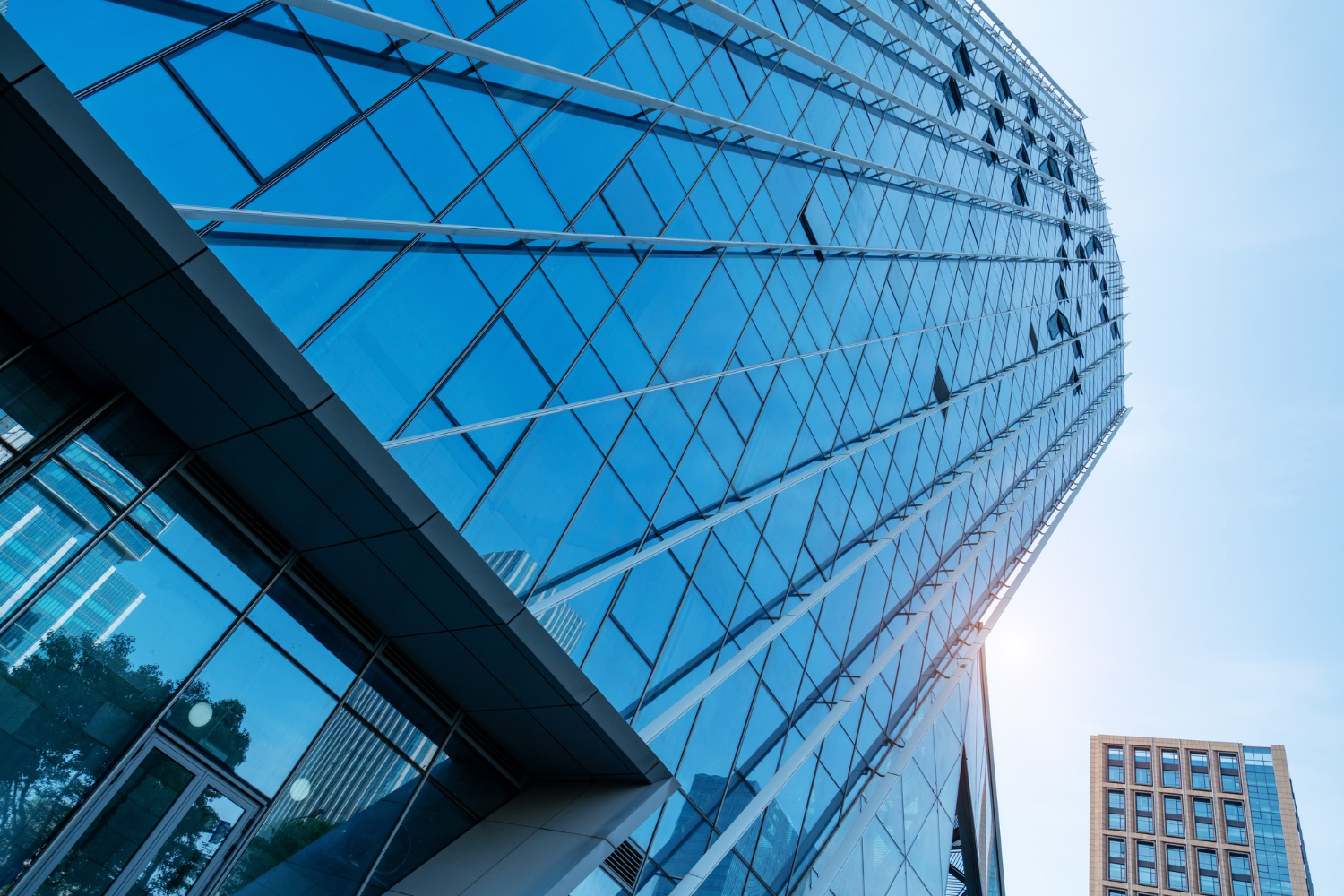 looking-up-blue-modern-office-building (1)