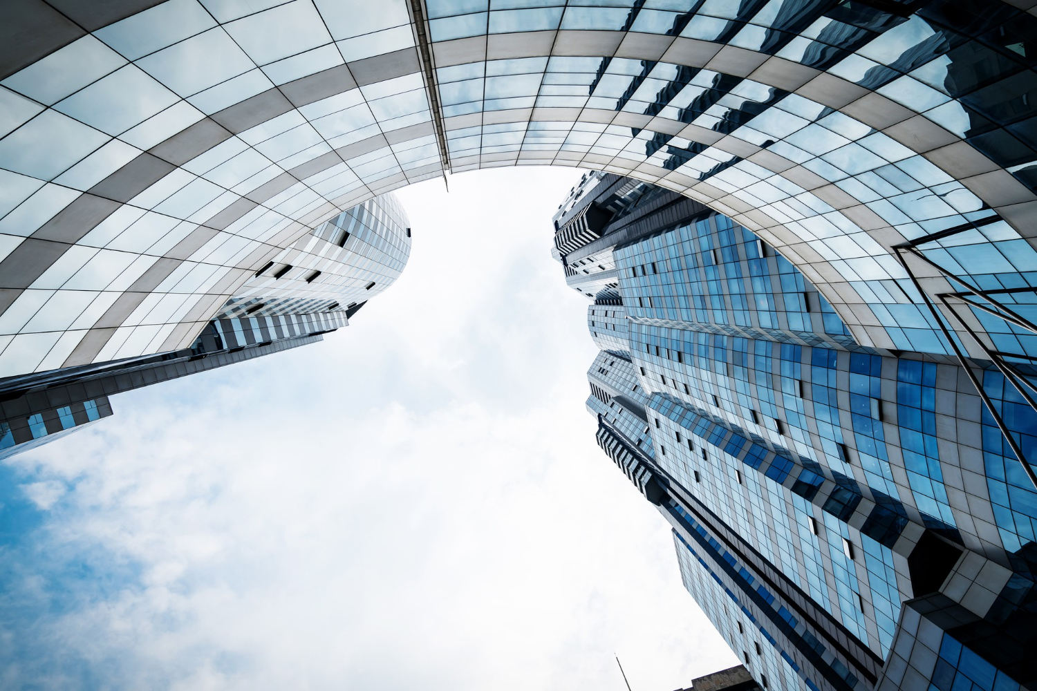 looking-up-blue-modern-office-building